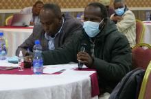 Participant at the CR WASH learning platform in Adam, Ethiopia, asking a question 