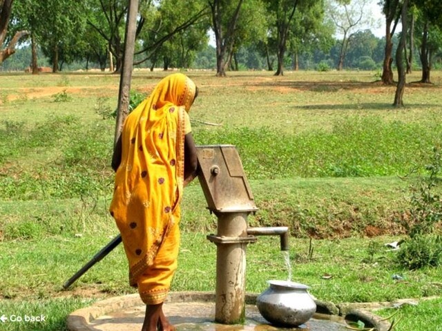 Woman fetching water - Bangladesh